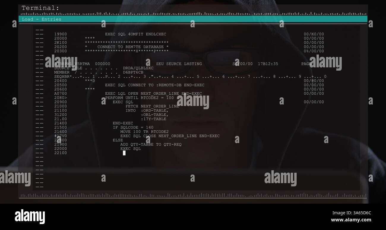 Image of data processing on computer screen over male hacker using computer Stock Photo