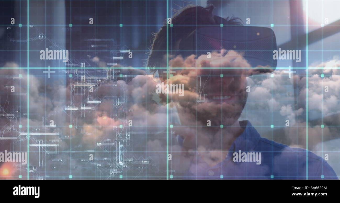 Man using VR headset exploring digital cloud technology in modern office Stock Photo