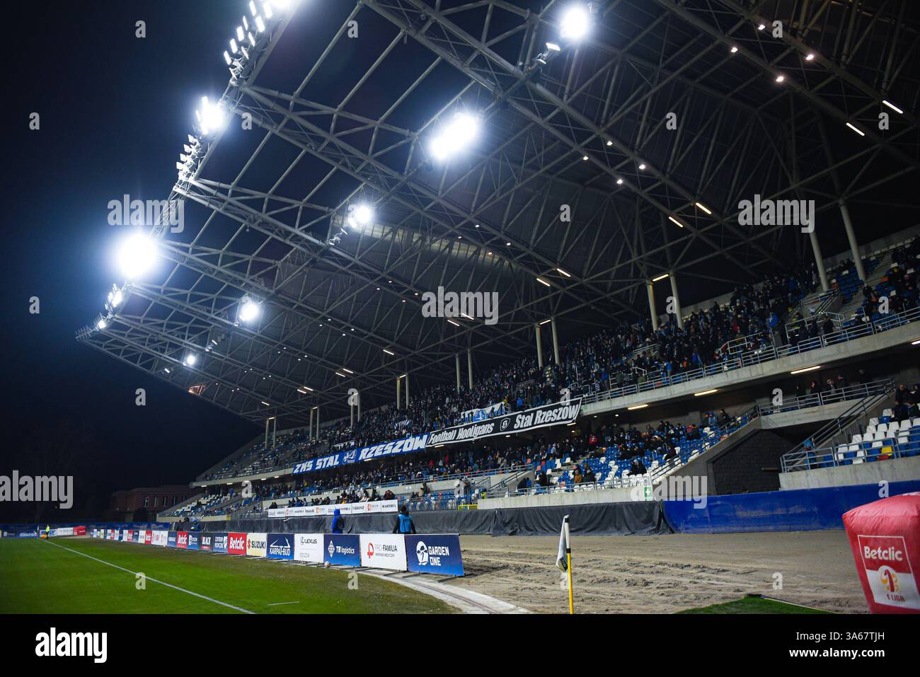 RZESZOW, POLAND - FEBRUARY 21, 2025: Betclic 1. Liga, Round 21 match Stal Rzeszow vs Kotwica Kolobrzeg 1:0. In photo Stal grandstand with fans. Stock Photo