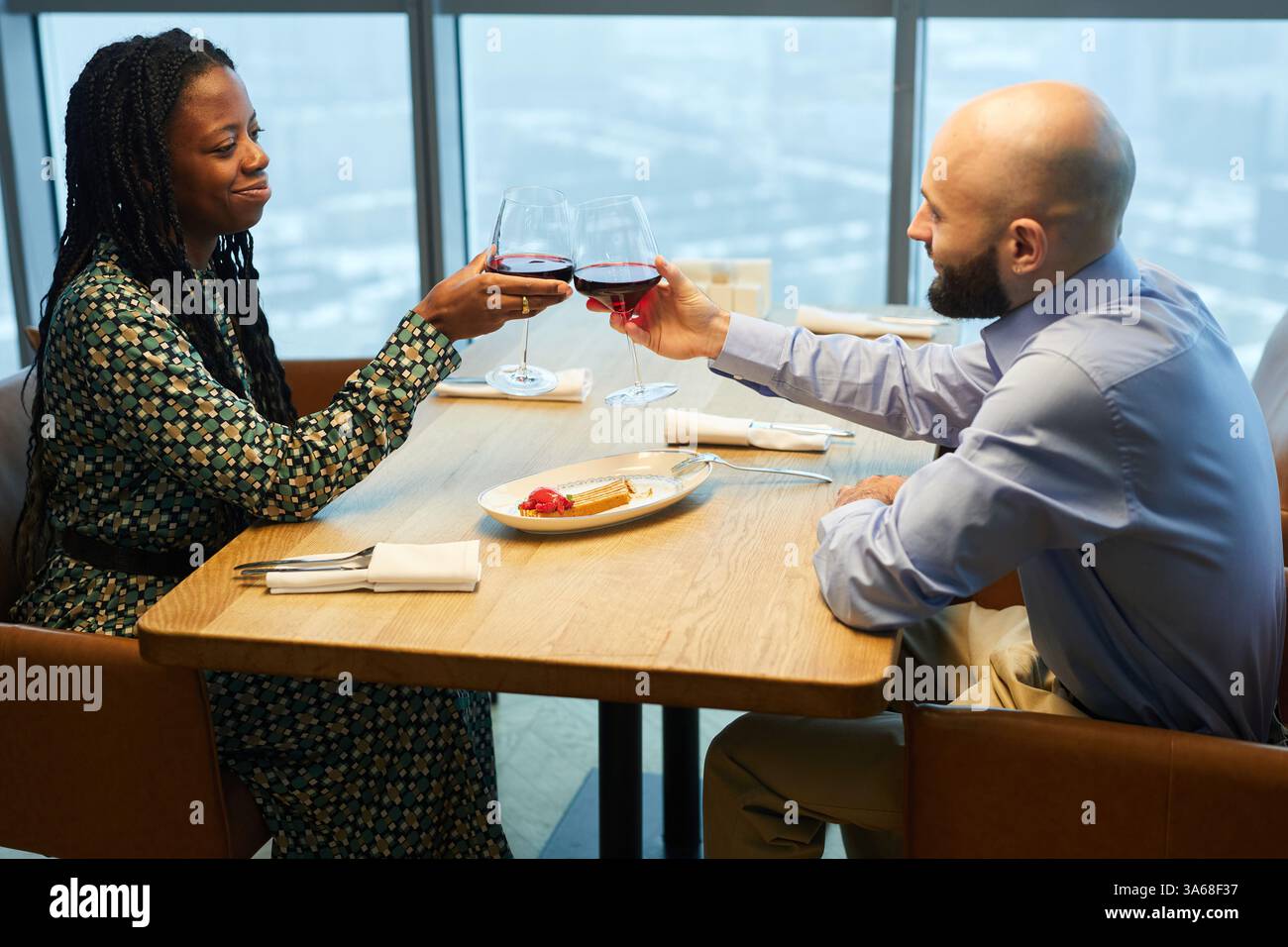Couple Having Romantic Date In Restaurant Stock Photo