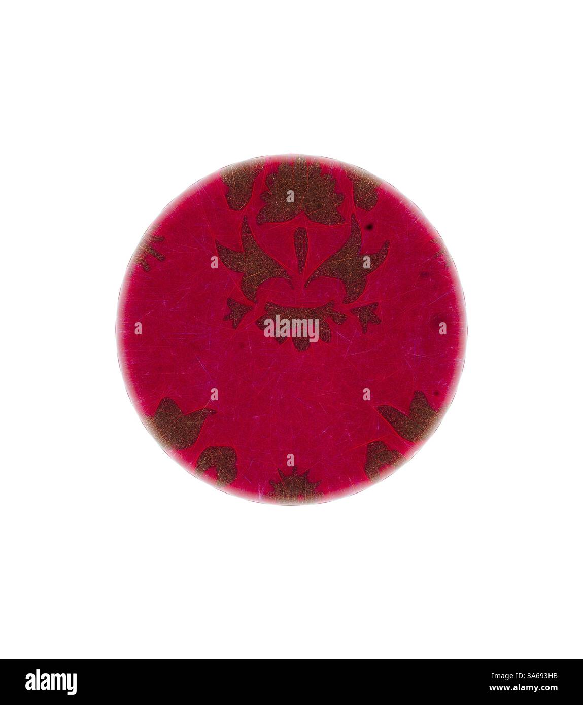 A circular object featuring a vibrant pink surface adorned with ...