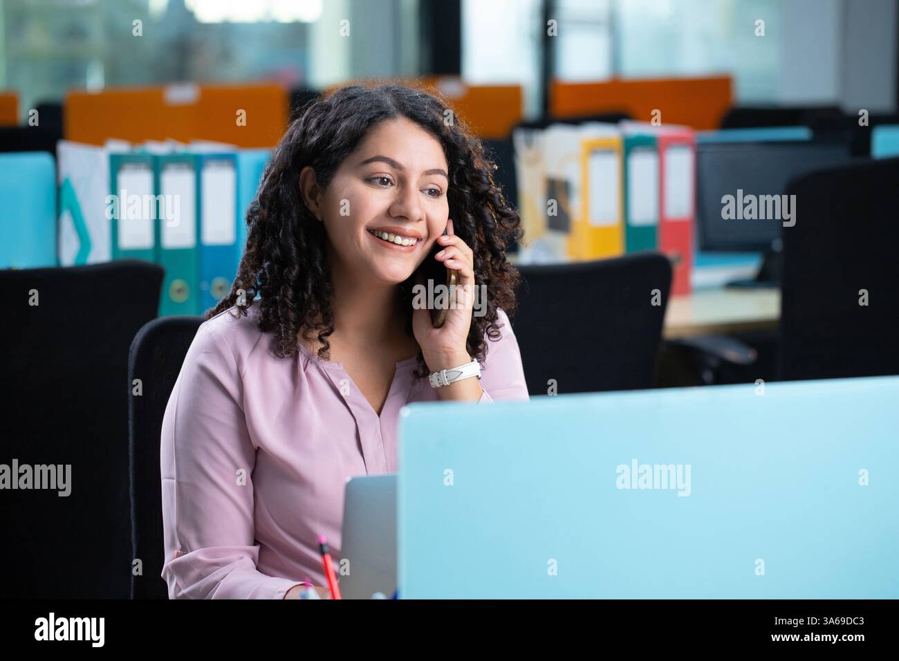 Corporate Woman Is Talking On Call Stock Photo