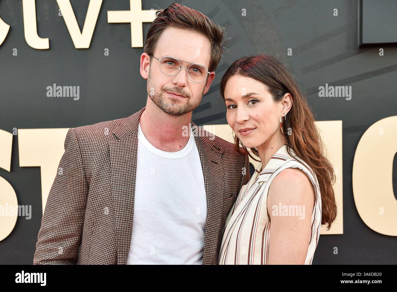 LOS ANGELES, CALIFORNIA, USA - MARCH 24: Patrick J. Adams and wife ...