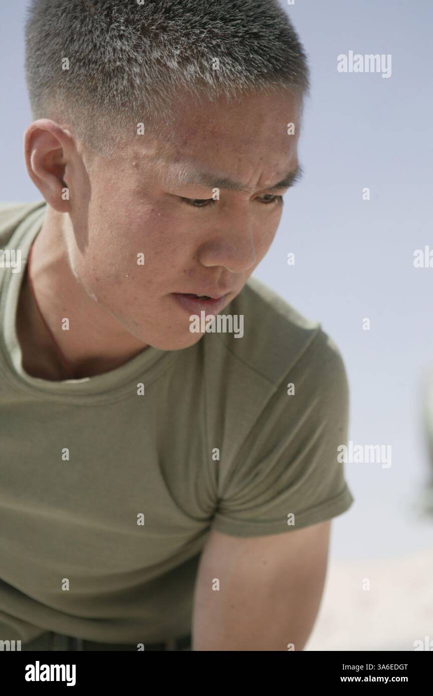 Sam Wireman Aug 14, 2004; Camp Taqaddum, Iraq; Cpl. SAM SHAO, a wireman with the ...