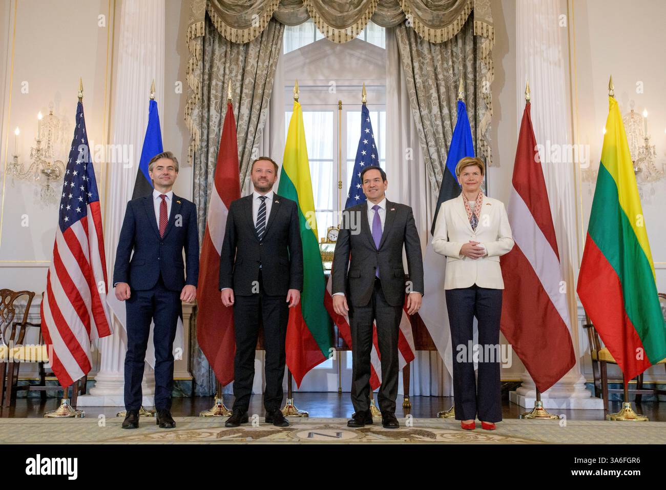 Why are NATO officials visiting Riga?
