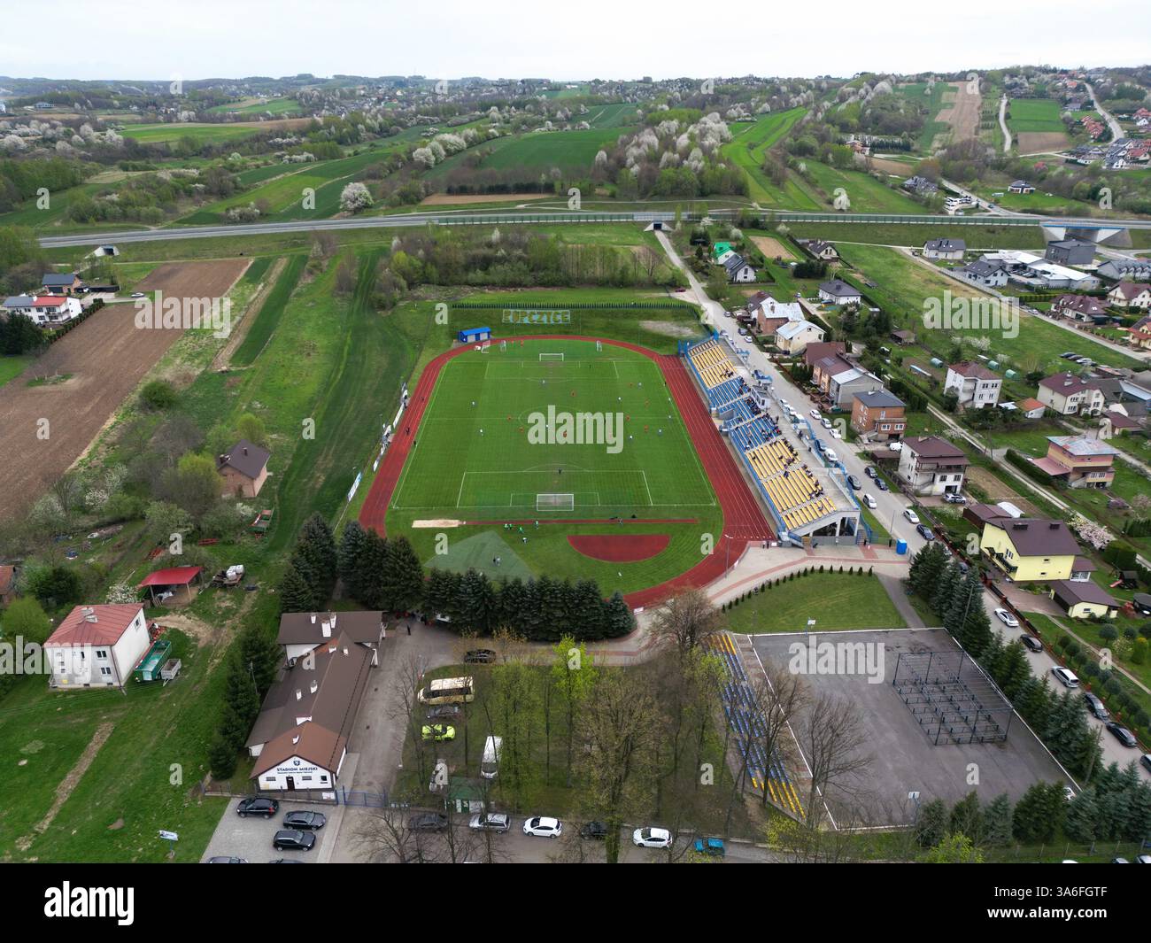 ROPCZYCE, POLAND – APRIL 6, 2024: Aerial view of a local football stadium of Błekitni Ropczyce, captured by drone. Stock Photo
