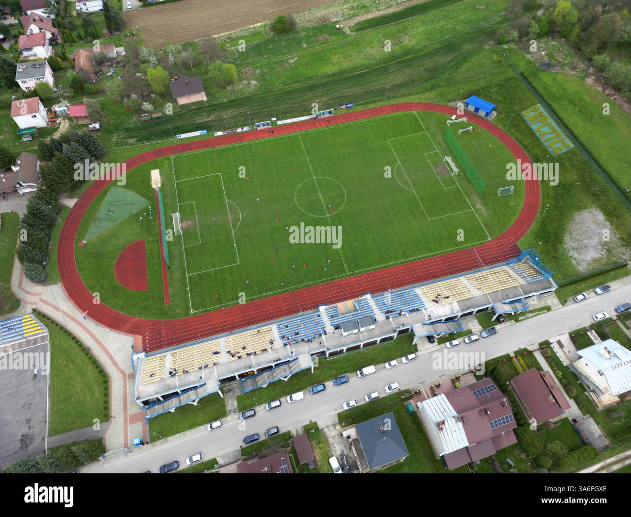 ROPCZYCE, POLAND – APRIL 6, 2024: Aerial view of a local football stadium of Błekitni Ropczyce, captured by drone. Stock Photo