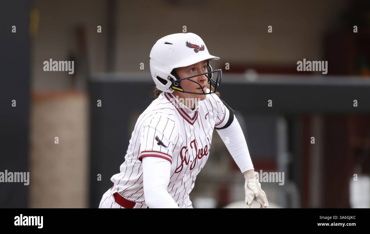 St. Joe's batter Riley York runs to first base while facing ...