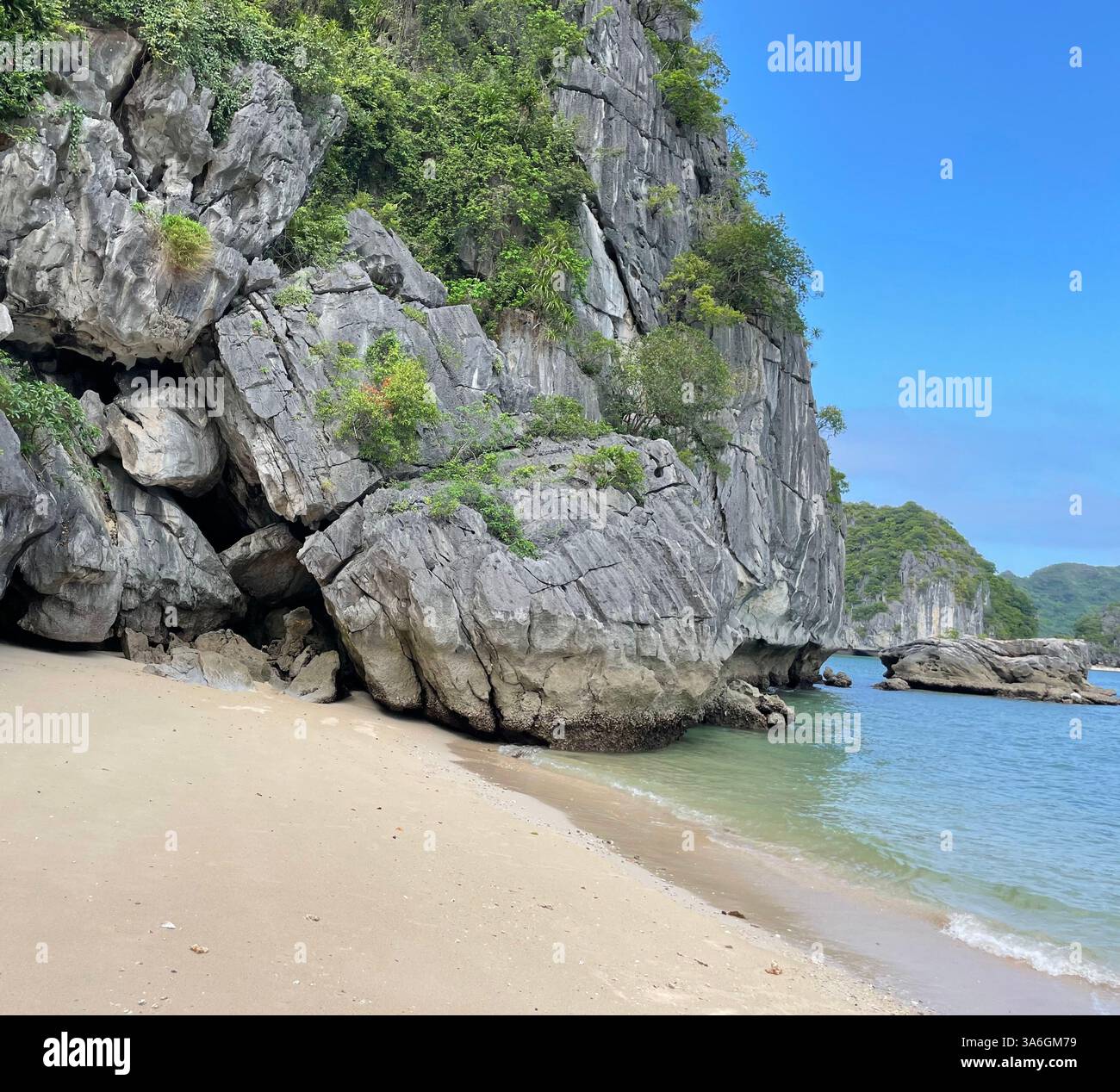 Beautiful beach in Ha Long Bay, Vietnam with Limestone Karsts - Smartphone Captured Stock Image