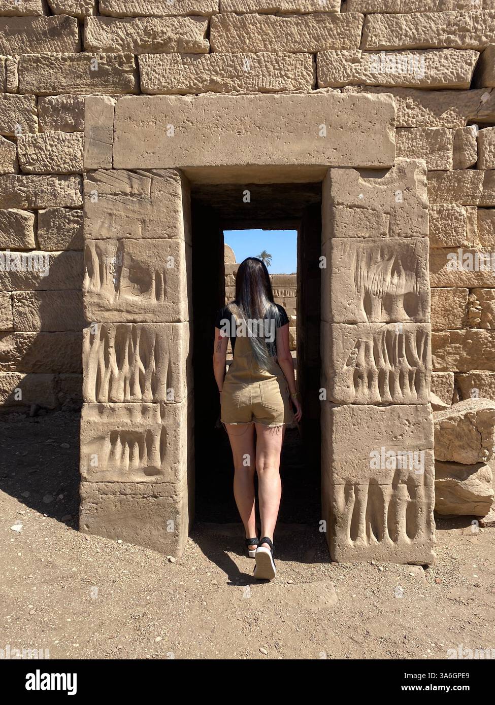 Exploring Ancient Egypt – Touching History Up Close - Smartphone Captured Stock Image