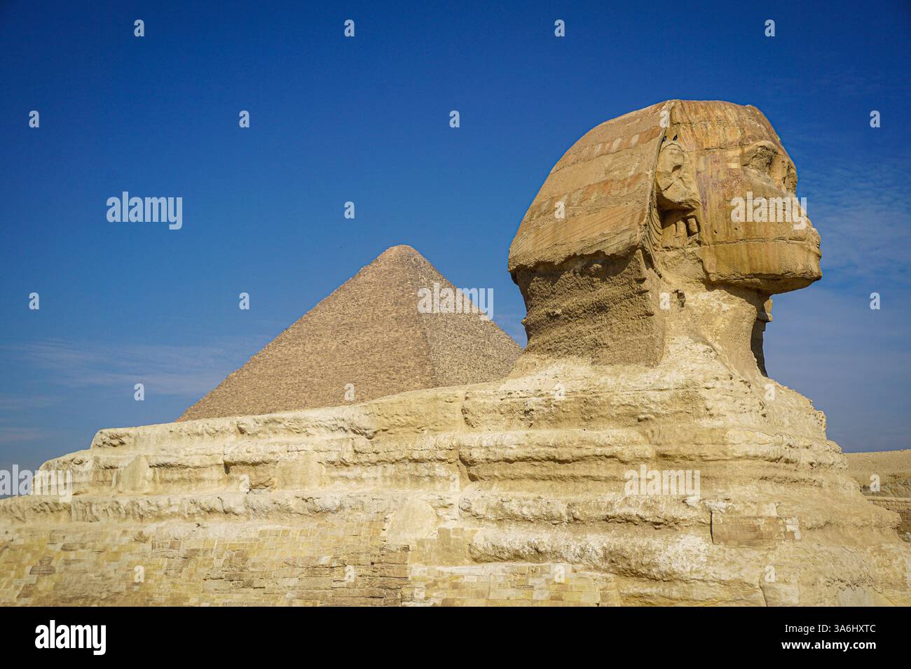 This photograph showcases the iconic Great Sphinx in the foreground and ...