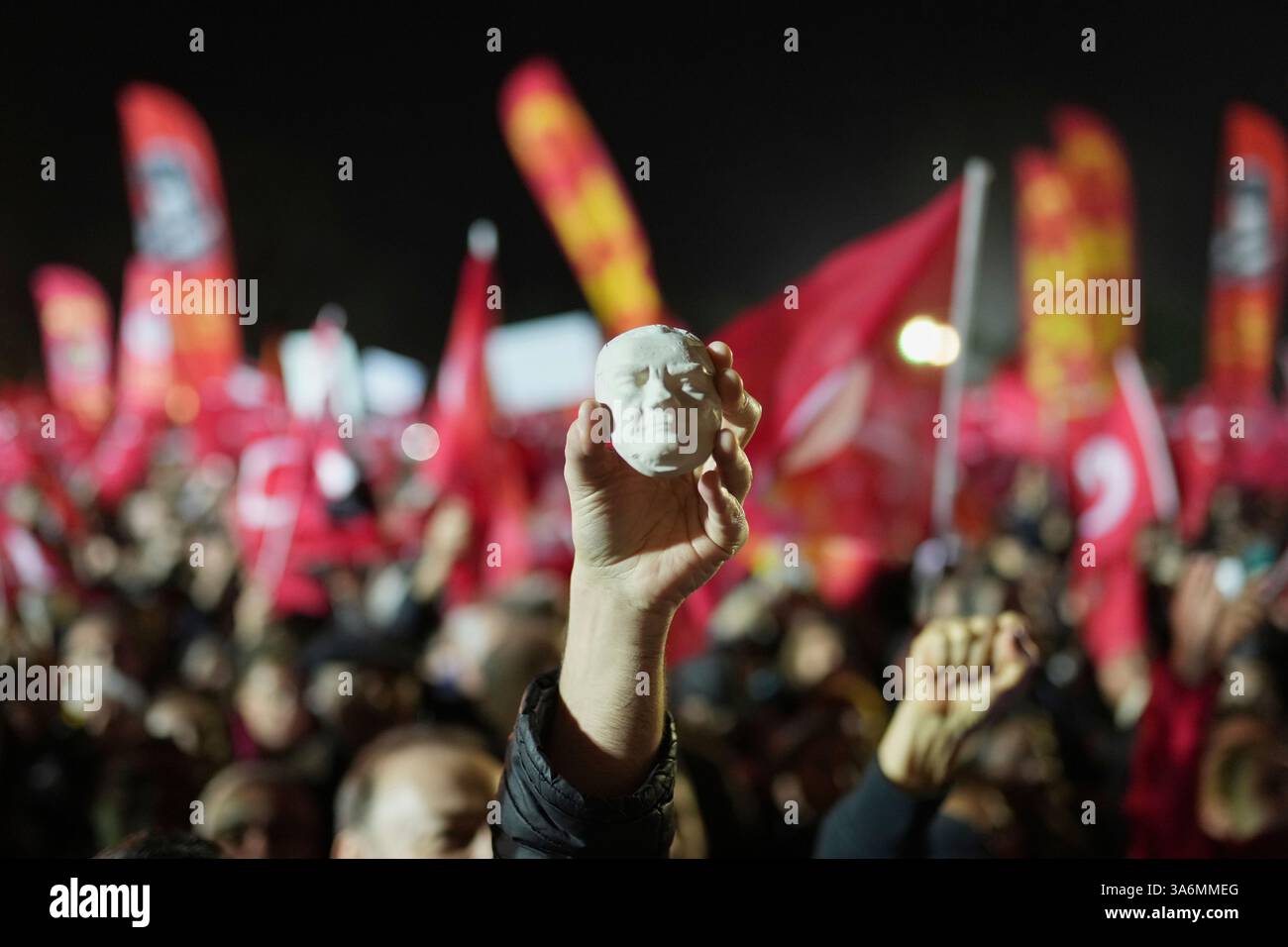 A protester holds a statue of Mustafa Kemal Ataturk during a protest ...