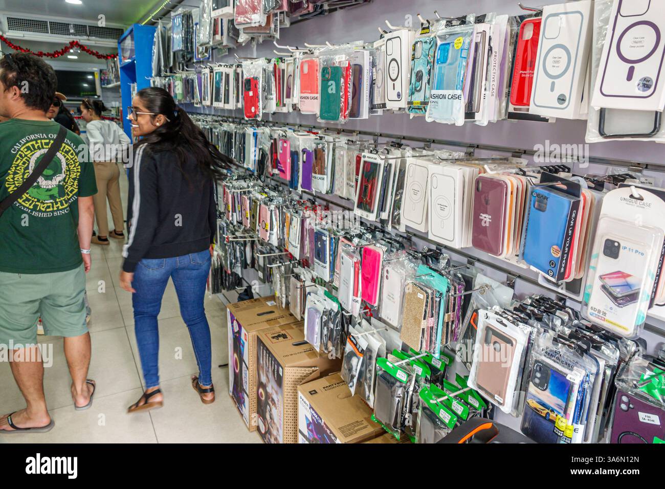 Philipsburg Sint St. Saint Maarten,Front Street,cell phone accessories store,phone case display,rack shelves retail,cell phone cases for sale,electron Stock Photo