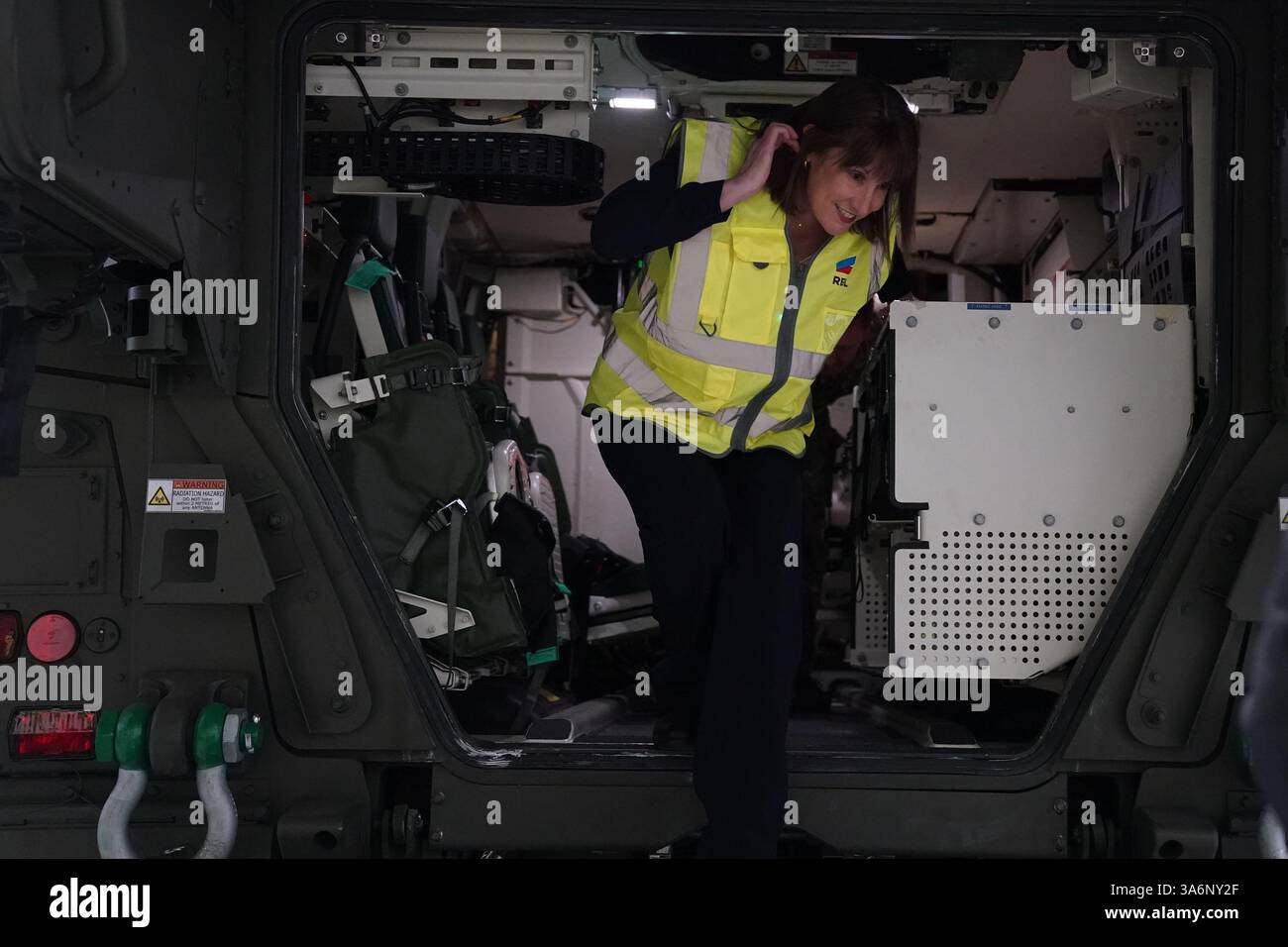 Chancellor of the Exchequer Rachel Reeves is shown a military vehicle ...