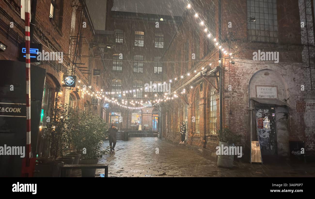 Poland - March 20th 2025: City urban street view in Lodz, Poland. Architecture, buildings and shops in this Polish town Łódź. - Smartphone Captured Stock Image