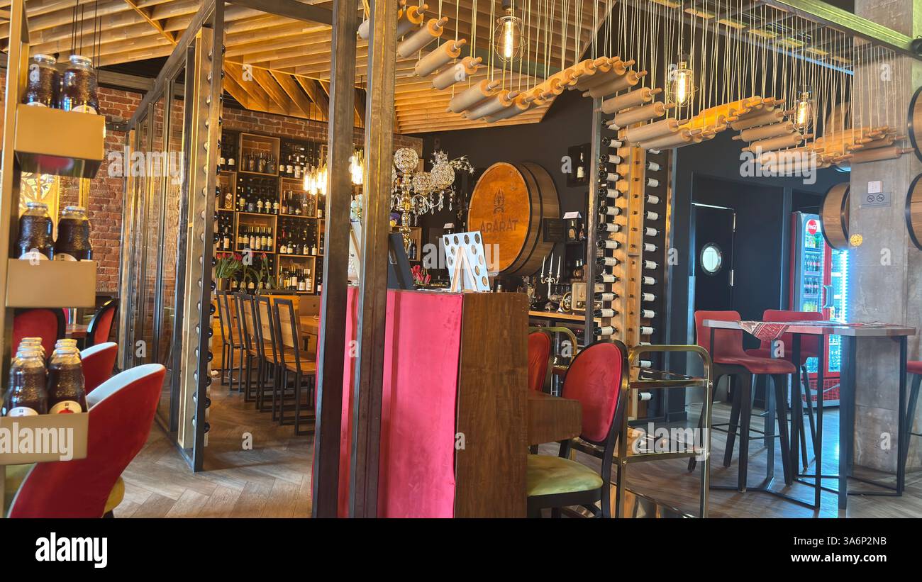 Stylish restaurant interior with high quality fittings and decorative features. Fine food and drink lunch dinner breakfast dining - Smartphone Captured Stock Image