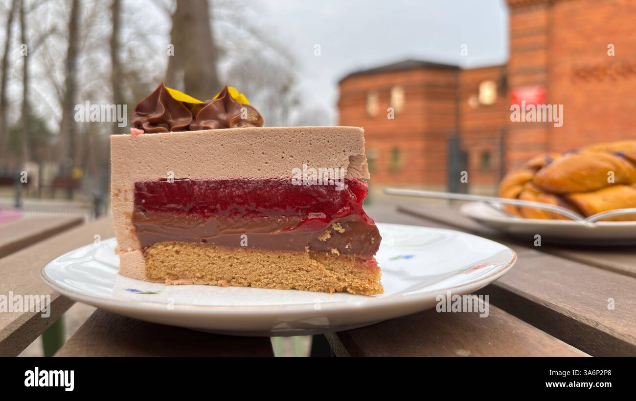 Beautiful delicious coffee and cake outdoors at a street cafe - Smartphone Captured Stock Image