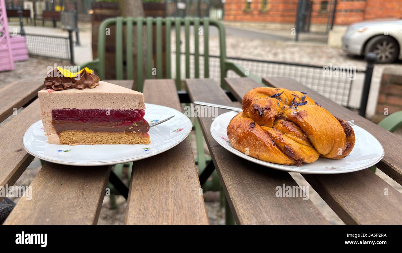 Beautiful delicious coffee and cake outdoors at a street cafe - Smartphone Captured Stock Image