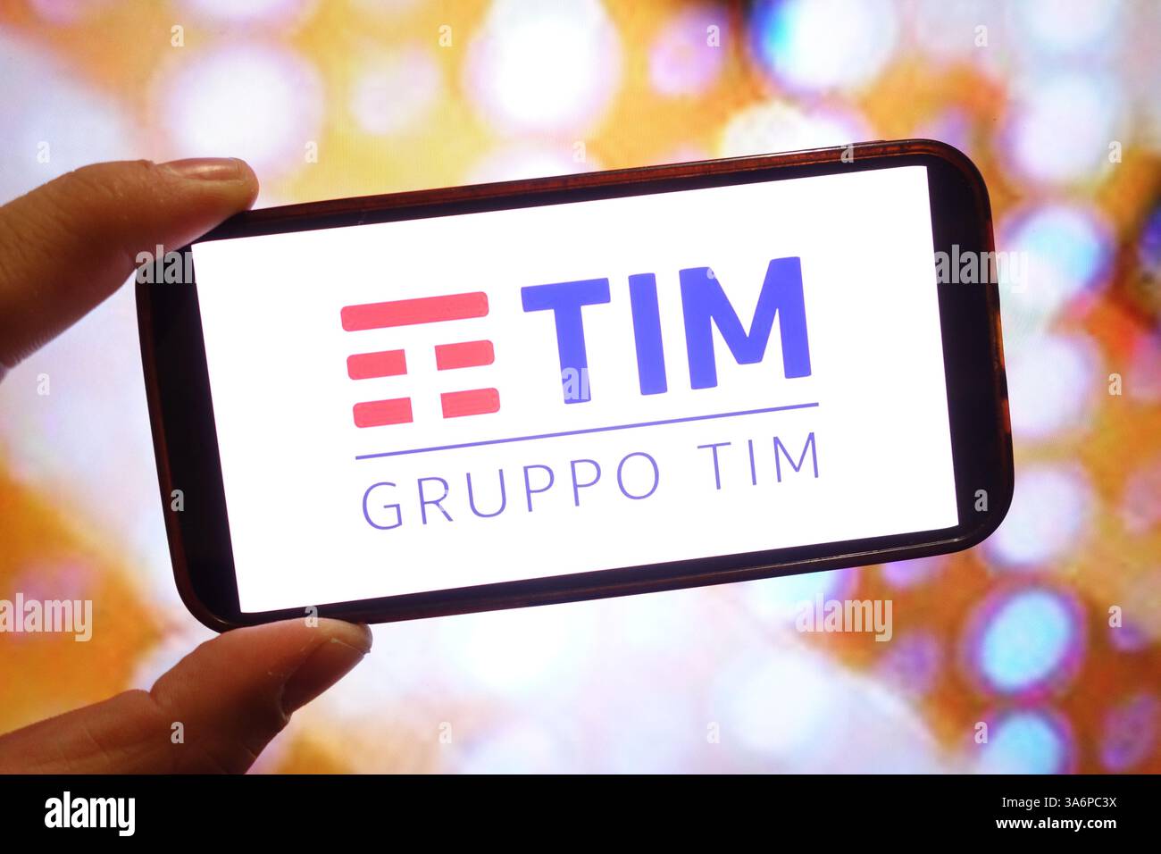 In this photo illustration, the Telecom Italia company logo is seen displayed on a smartphone screen. Stock Photo