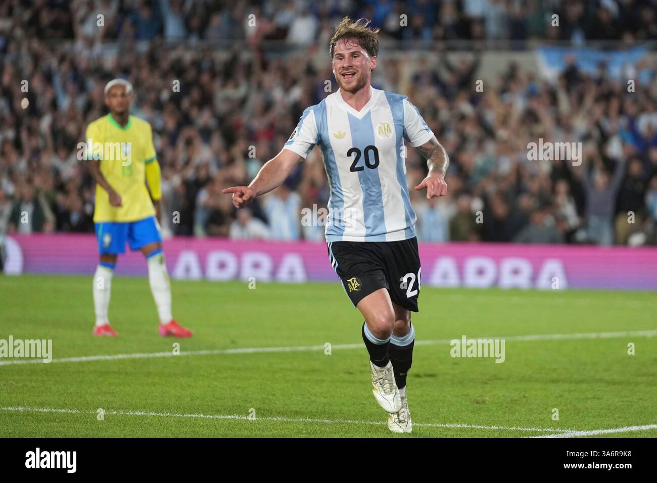 Argentina's Alexis Mac Allister celebrates scoring his side's third