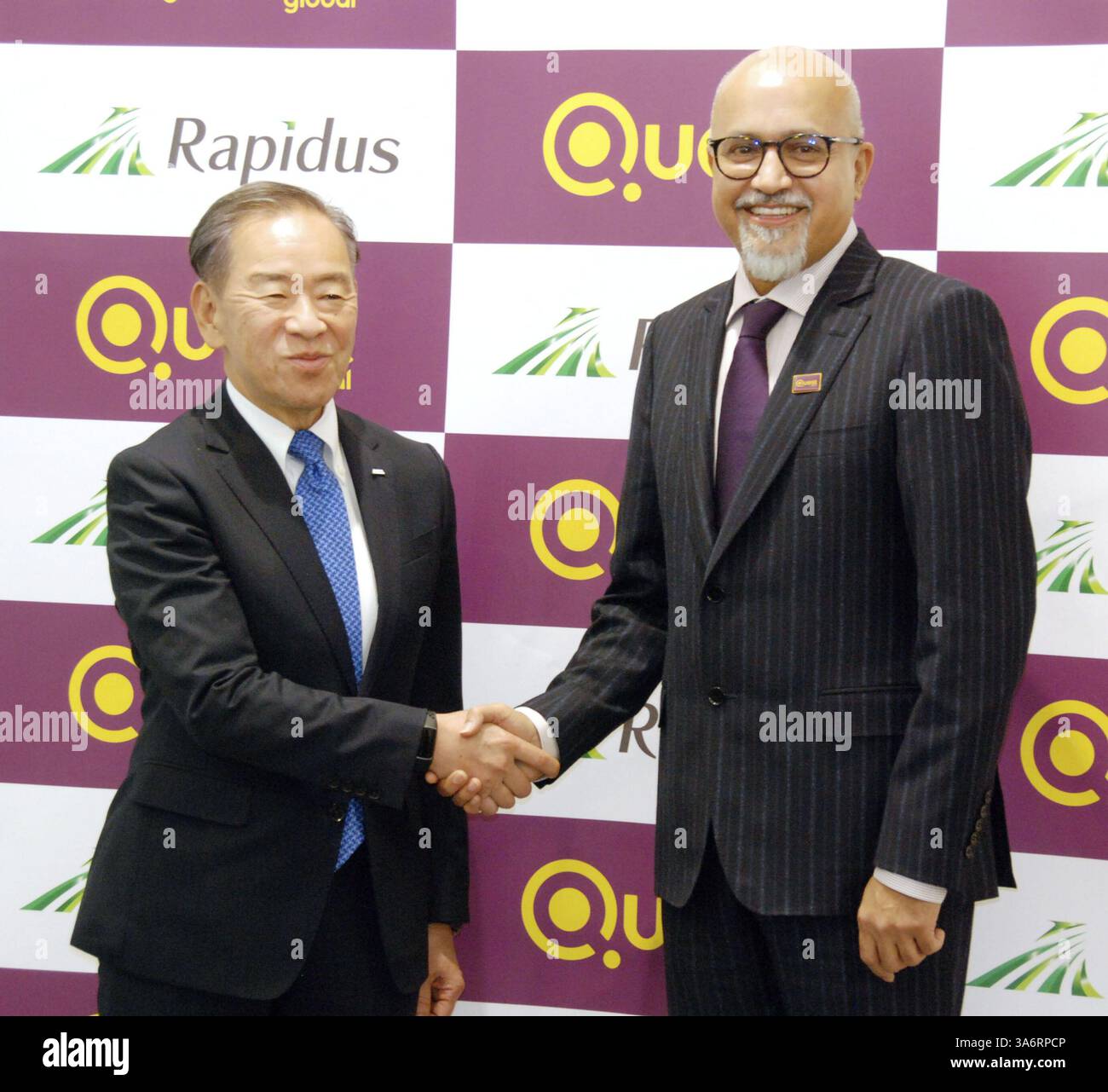 Atsuyoshi Koike (L), president of Japan's state-backed chip venture ...