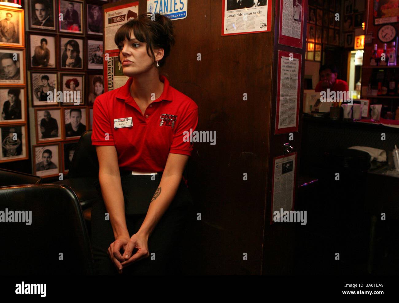 Oct. 9, 2008 - Kelly Stevens is working as a waitress in a comedy club in Chicago, Illinois, where she is shown on October 9, 2008, to make ends meet. A year after getting her bachelor's degree in fashion marketing she is finding the current economy makes it difficult to get a marketing job or open her own shop as she had dreamed. (Abel Uribe/Chicago Tribune/MCT) (Credit Image: © Abel Uribe/MCT/ZUMAPRESS.com) Stock Photo