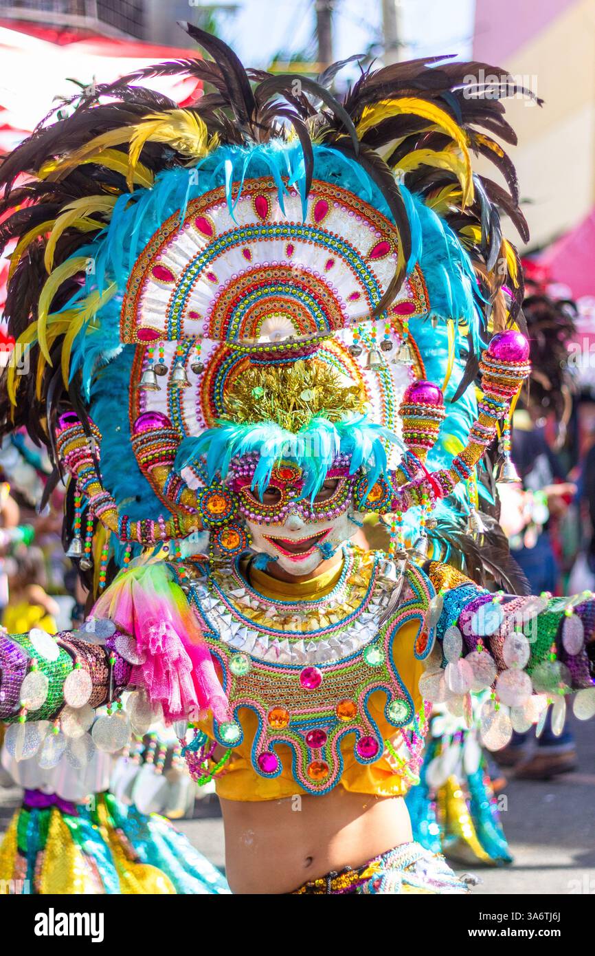 Masks Joined Colorful and elaborately costumed Masskara Festival dancers wearing ...