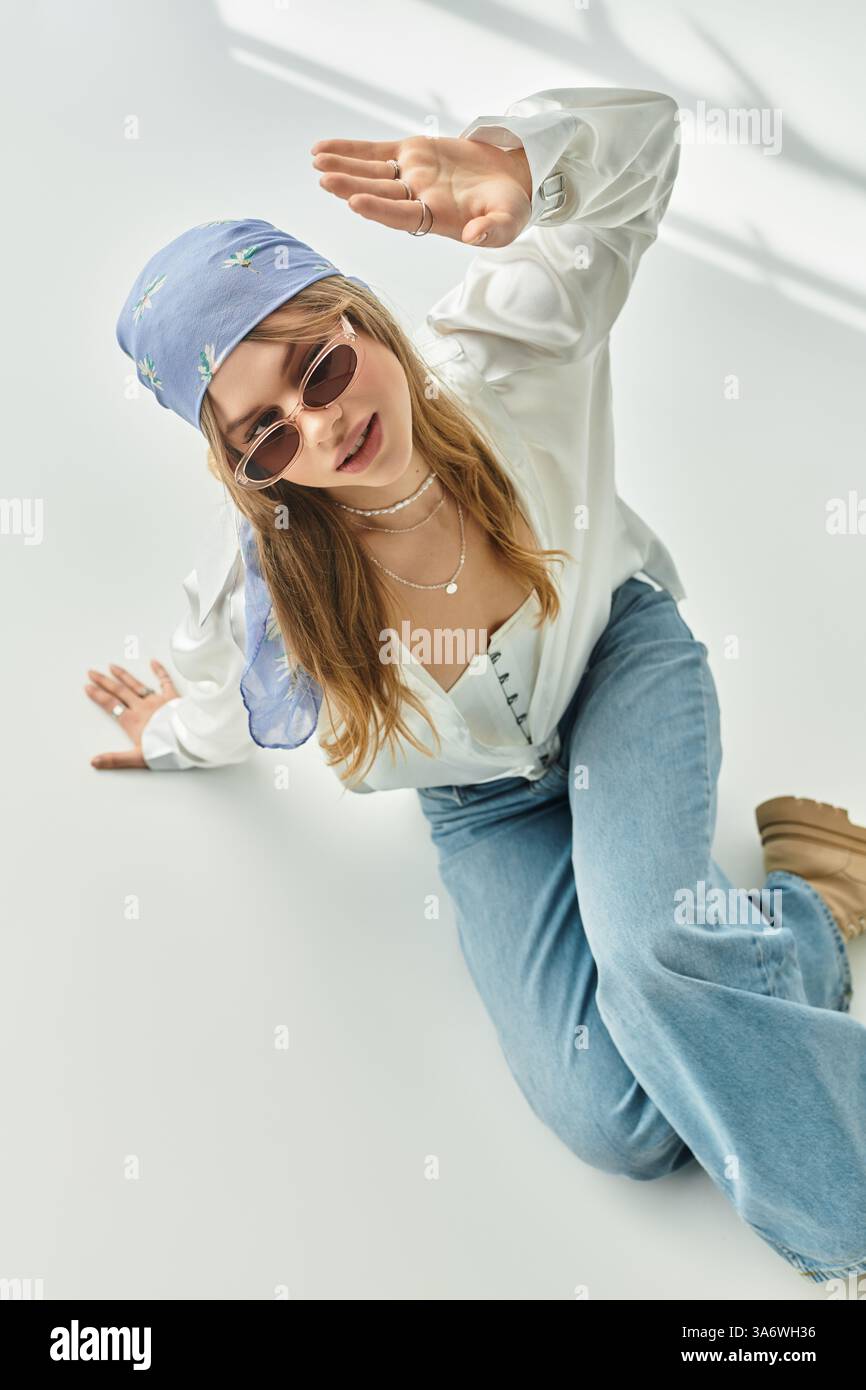 A woman in a playful spring outfit shines with youthful energy in a ...