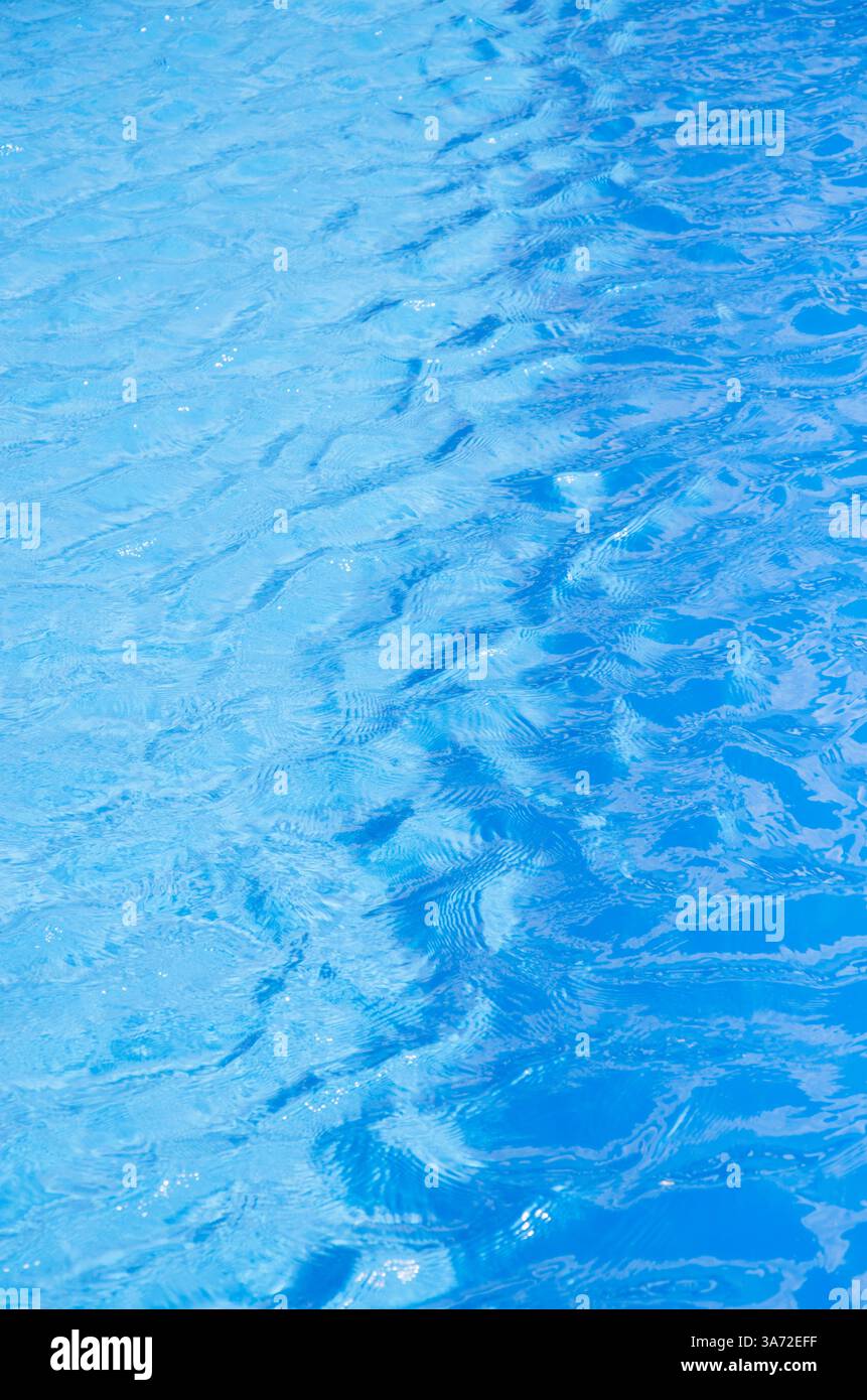 Sunlight reflected on swimming pool water Stock Photo - Alamy