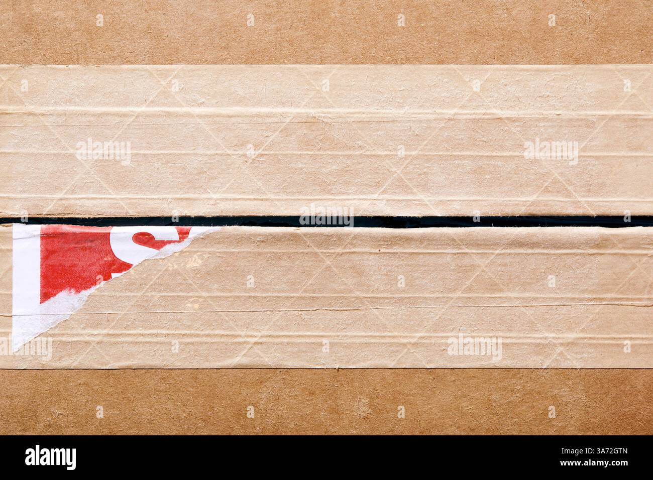 Close-up of cardboard box with tape Stock Photo