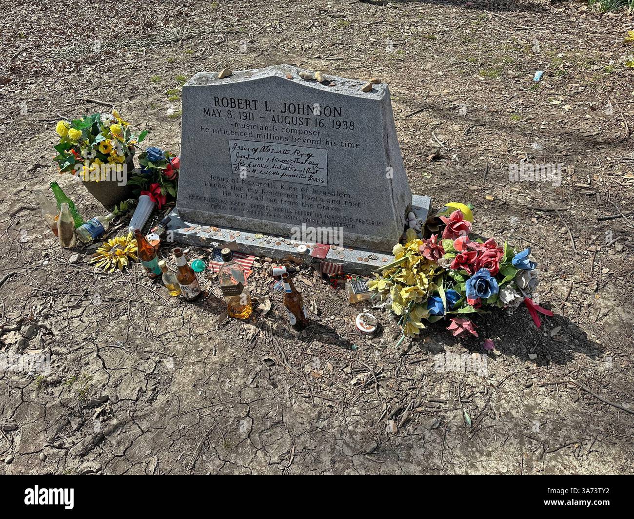 USA Mississippi MS Greenwood The grave of blues musician Robert Johnson headstone with flowers and gifts - Smartphone Captured Stock Image