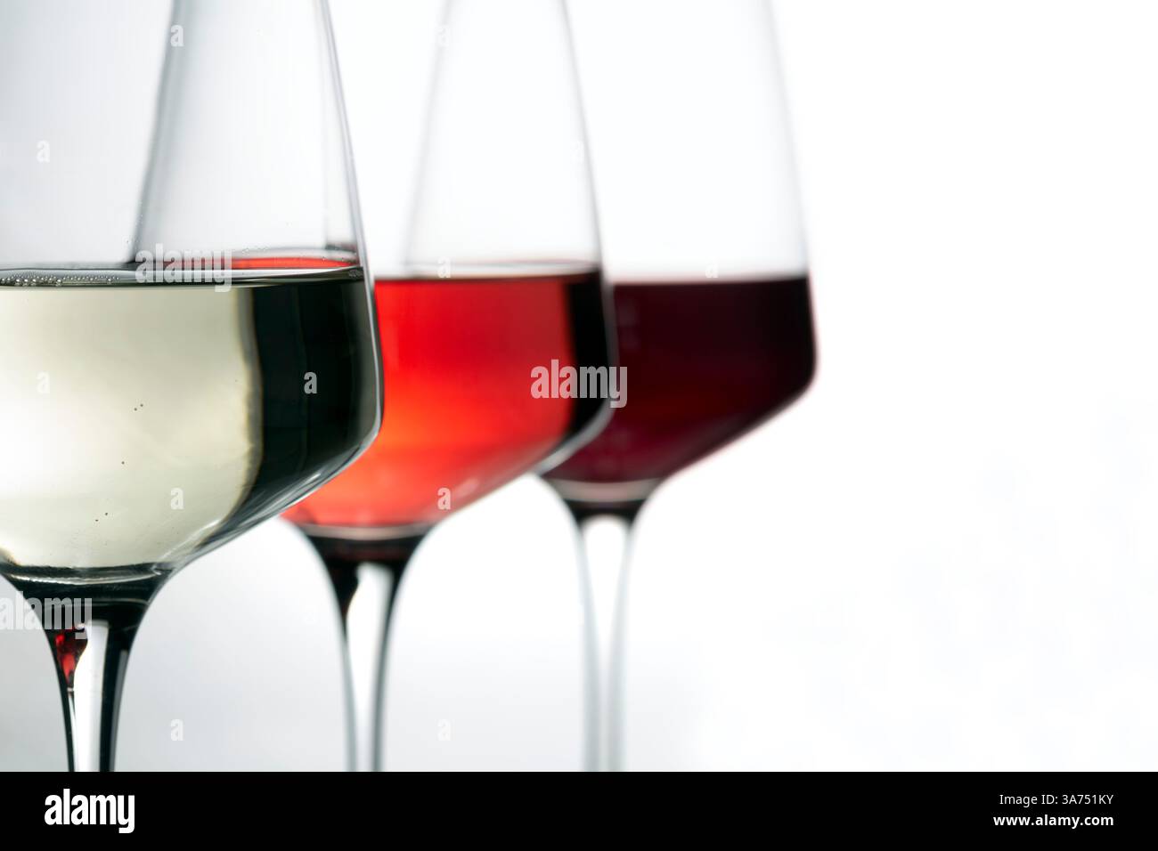 three wine glasses with wine on white  background Stock Photo
