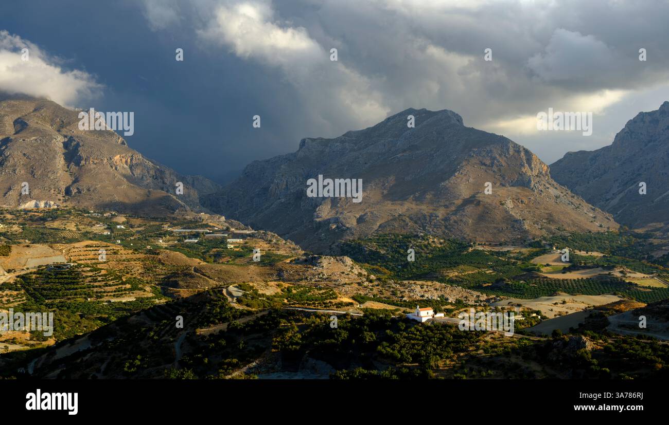 Here's a caption for the image: A dramatic landscape unfolds in Crete ...