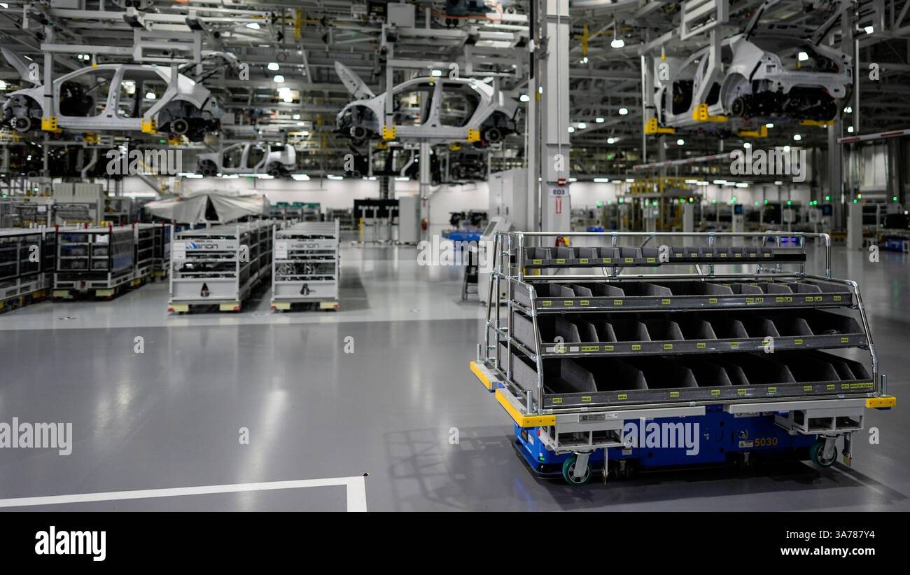 Vehicles move on the line at the Hyundai Motor Group Metaplant America ...