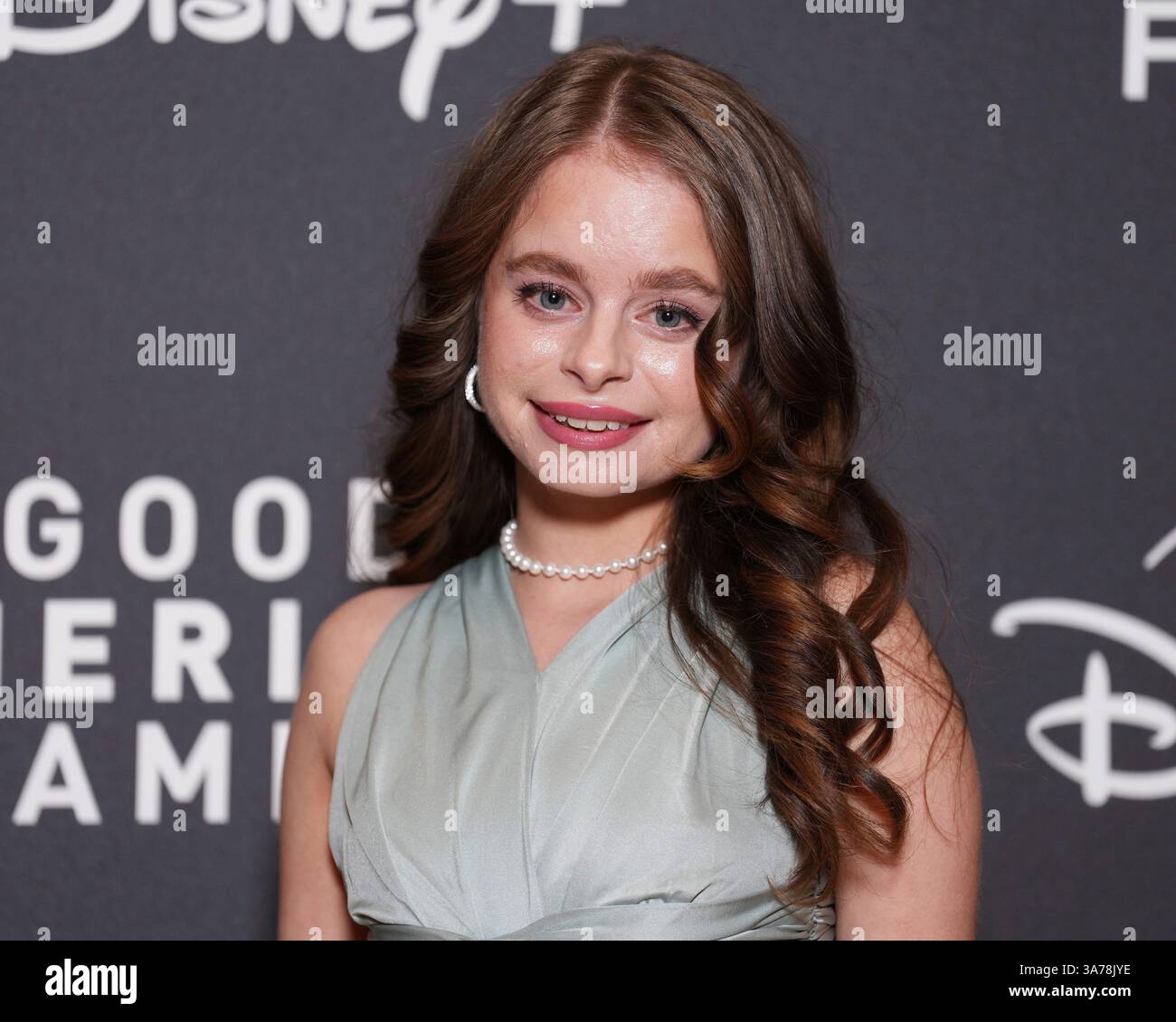 Imogen Faith Reid poses for photographers upon arrival for the special