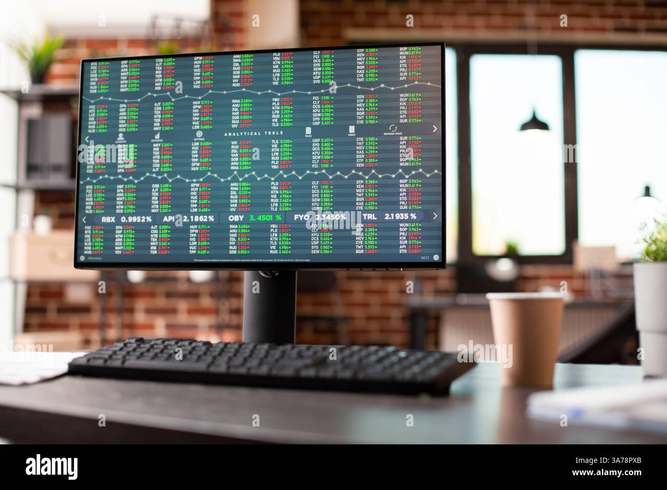 Closeup of desktop pc screen in office shows financial analytics, set ...