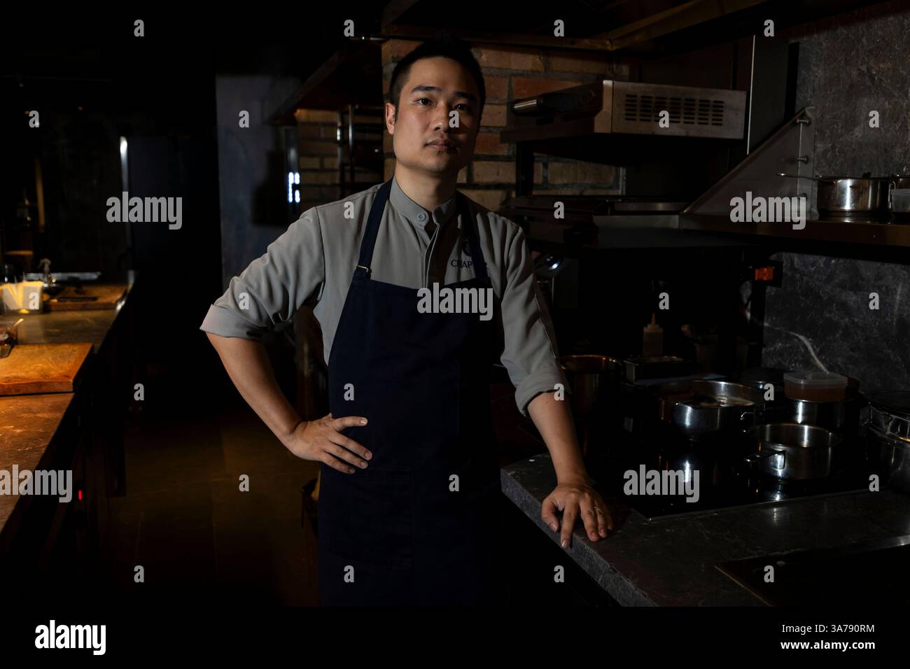 Quang Dung, the chef and owner of Chapter Dining, poses for a photo on ...