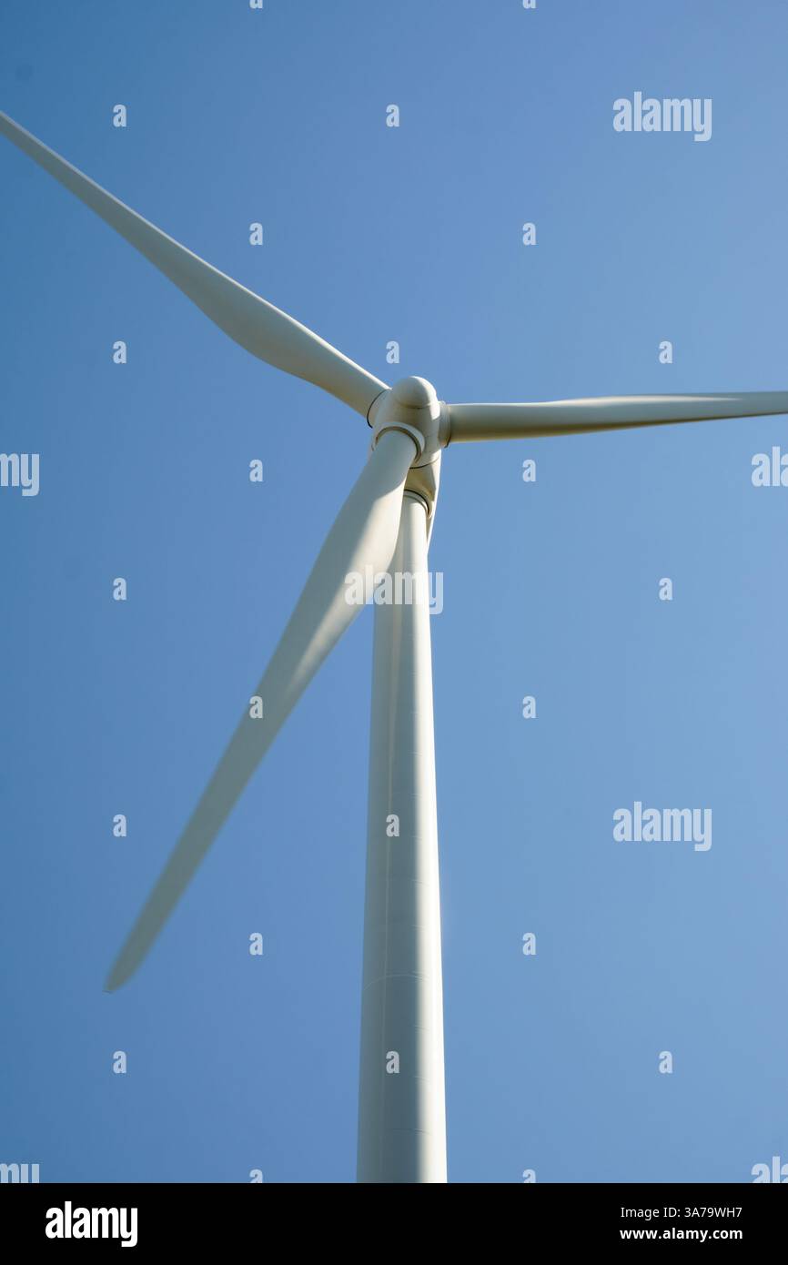 close up Wind turbine with blue sky at background Stock Photo - Alamy