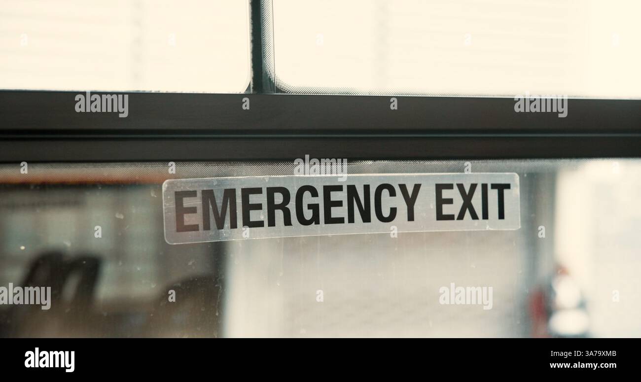 Bus, window and emergency exit with safety, sign and public transport ...