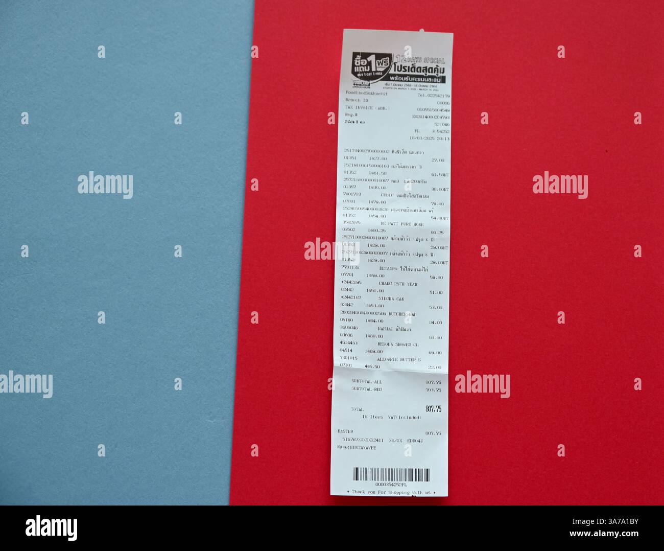 Bangkok supermarket till and credit card payment receipts. Stock Photo