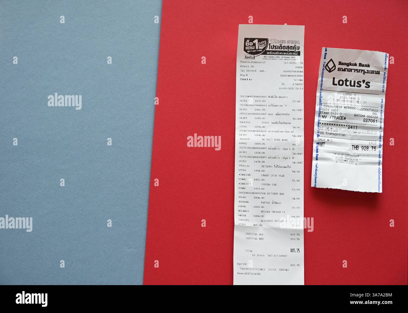Bangkok supermarket till and credit card payment receipts. Stock Photo