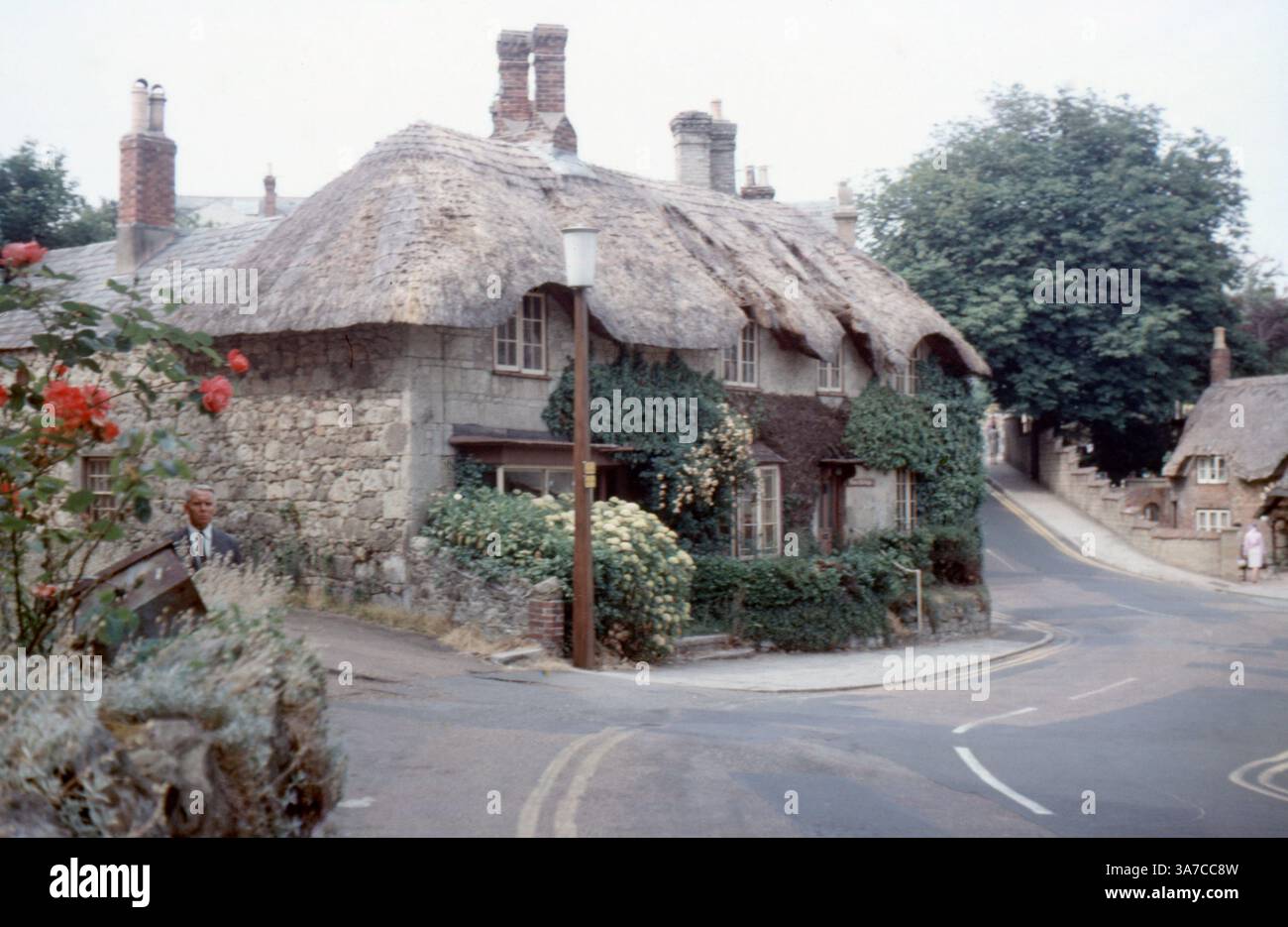 A timeless 1960s village scene in Shanklin, Isle of Wight, featuring a ...