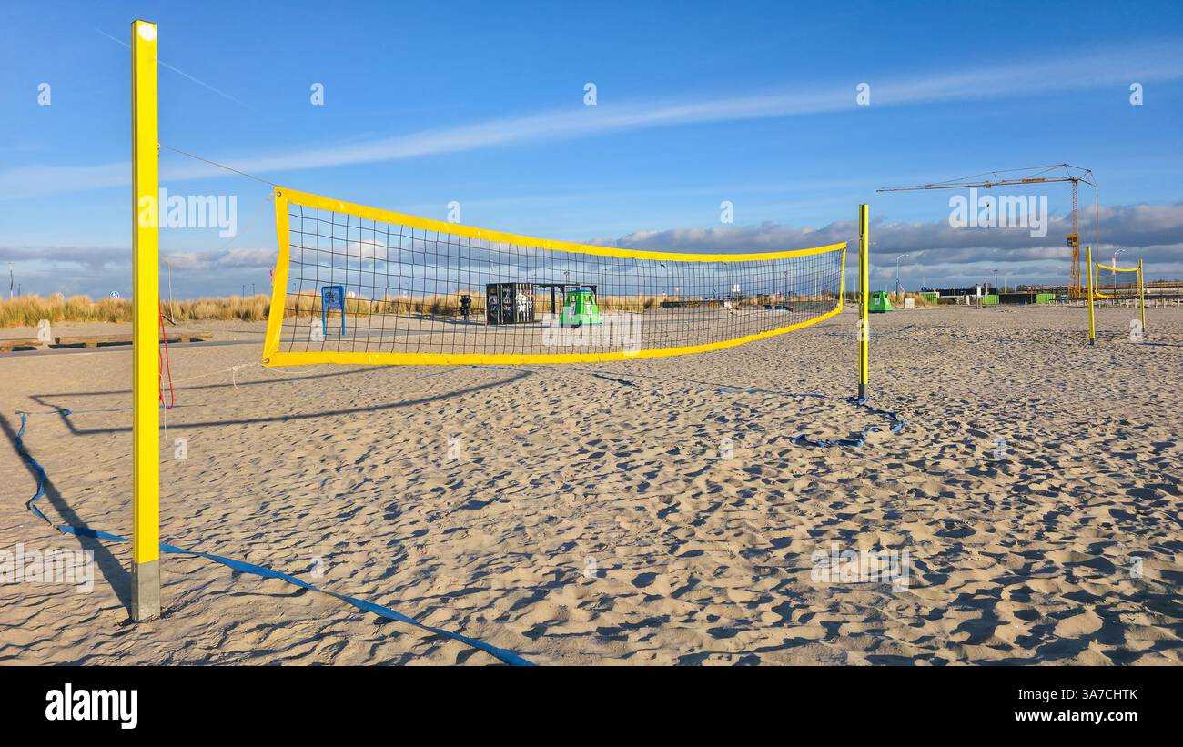 Beach volleyball net on sandy shore - Smartphone Captured Stock Image