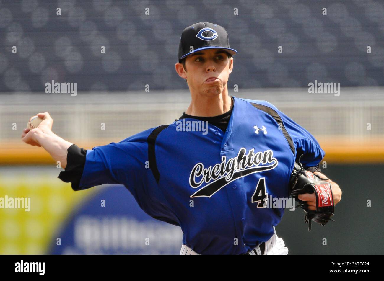 April 7, 2013 - Omaha, Nebraska, U.S - Creighton right handed pitcher Bryan Sova (4) earned his first save as Creighton defeated Bradley 7-3 to sweep a three game series in a game played before at TD Ameritrade Park in Omaha, Nebraska. (Credit Image: © Steven Branscombe/ZUMAPRESS.com) Stock Photo