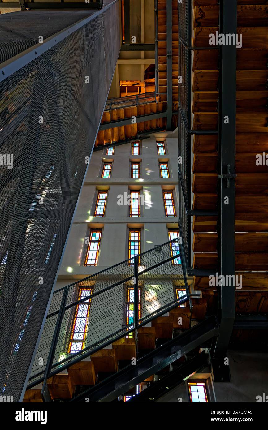 CALAIS, FRANCE, March 15, 2025 : Inside the Belfry of Calais city Hall, a large staircase and an elevator have been built for the confort of visitors. Stock Photo