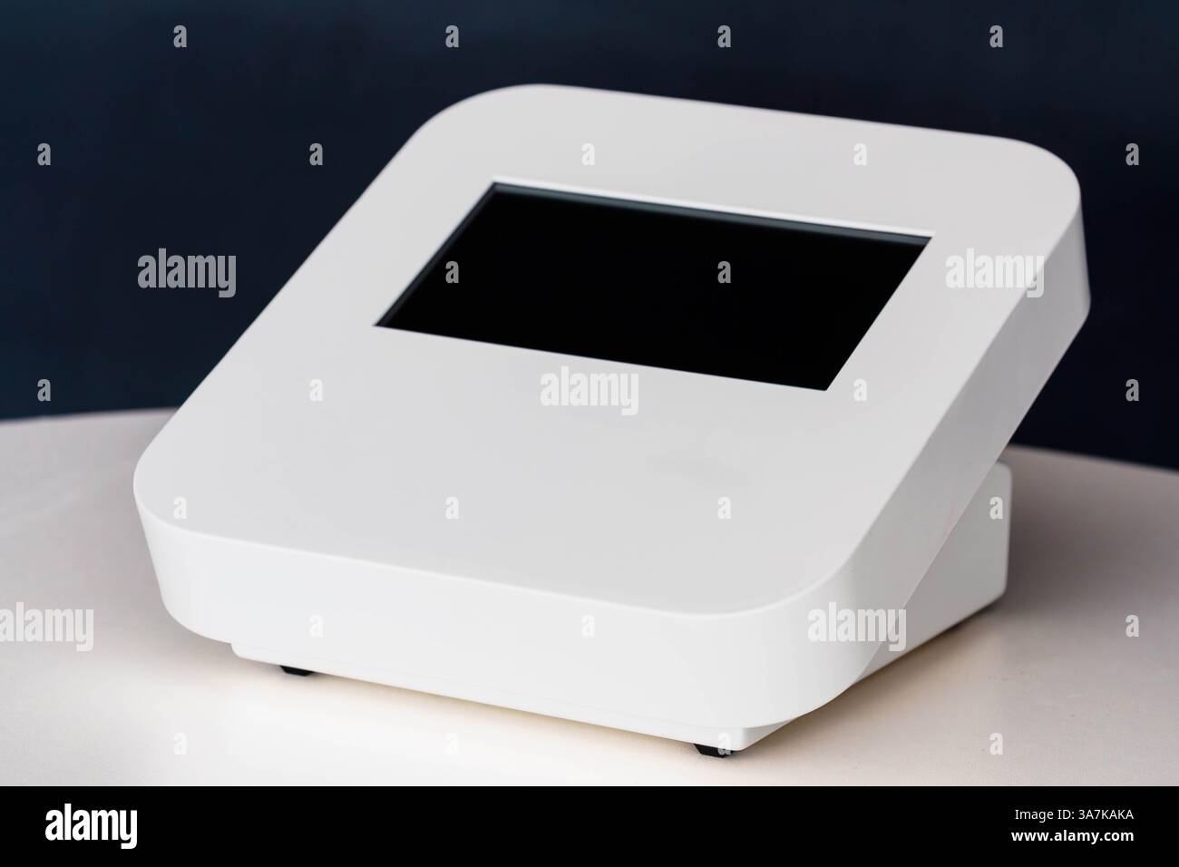 Modern White Electronic Device Display with Blank Screen on Black Background. Stock Photo