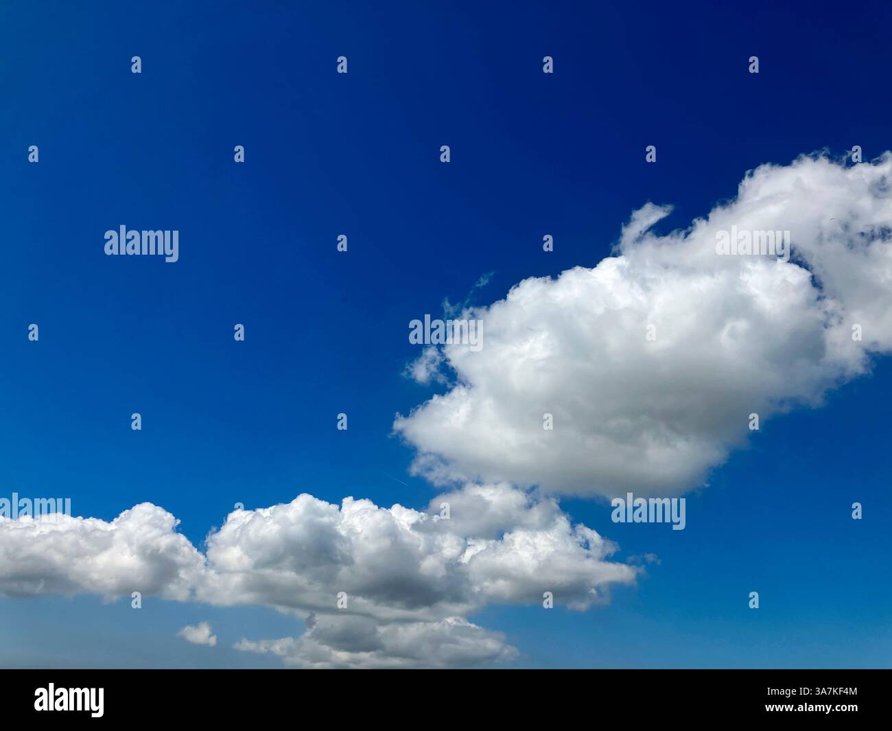 Skyscape. Blue sky with Cumulus clouds. Stock Photo