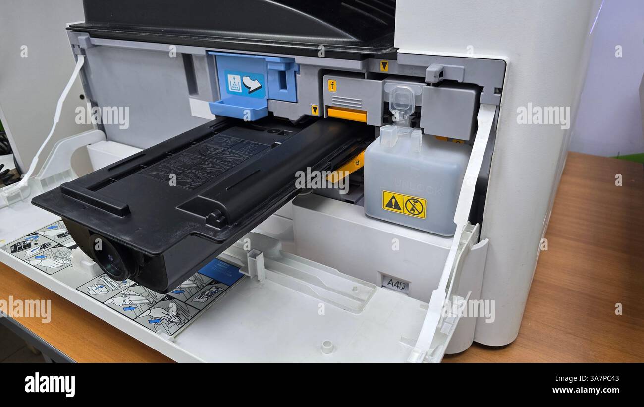 Replacing toner cartridge in modern laser printer Stock Photo