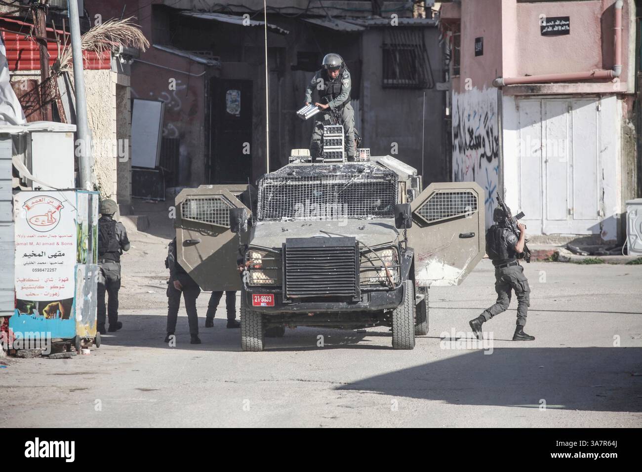 Israeli military soldiers surround the Askar refugee camp east of ...
