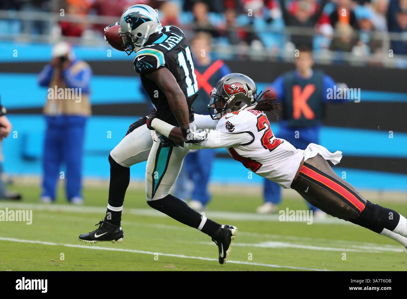 November 18, 2012; Carolina Panthers wide receiver Brandon LaFell (11) tries to get rid of Tampa Bay Buccaneers strong safety Mark Barron (24) at Bank of America Stadium in Charlotte,NC.  Panthers lose in overtime to Tampa Bay 27-21.(Credit Image: © Jim Dedmon/Cal Sport Media/ZUMAPRESS.com) Stock Photo